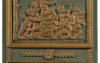 Trumeau de style Louis XVI en bois sculpté, doré et patiné vert décoré d'un "Char...