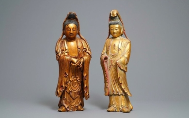 Two large Chinese gilt lacquered wood figures of...