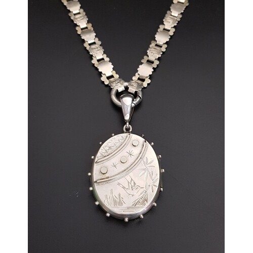 VICTORIAN UNMARKED SILVER LOCKET PENDANT with engraved bird,...