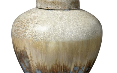 Valdemar Engelhardt: A porcelain lid jar decorated with ochre cristaline glaze with cloe and grey elements. H. 21 cm.