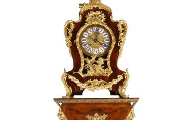 Wall clock with console, Rococo style. 19th century.