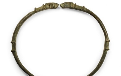 Western Asiatic Bronze Bracelet with Beast Head Terminals