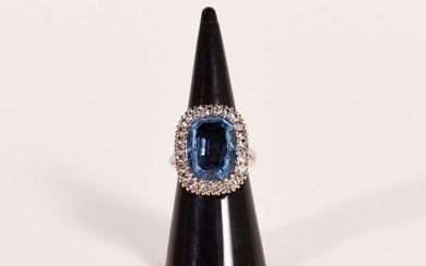 White gold ring set with a blue spinel for ladies