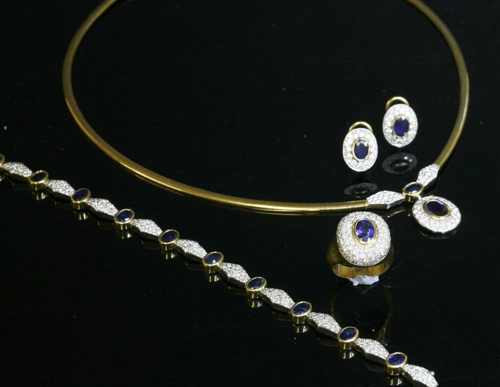 A yellow and white gold sapphire and diamond matched necklace, bracelet, ring and earring suite