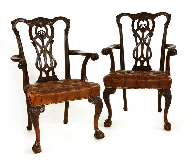 A pair of Chippendale-style mahogany open armchairs