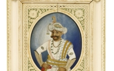 An Indian ivory portrait of a maharaja, three-quarter length watercolour on ivory, 12 x 14.5cm, in ...