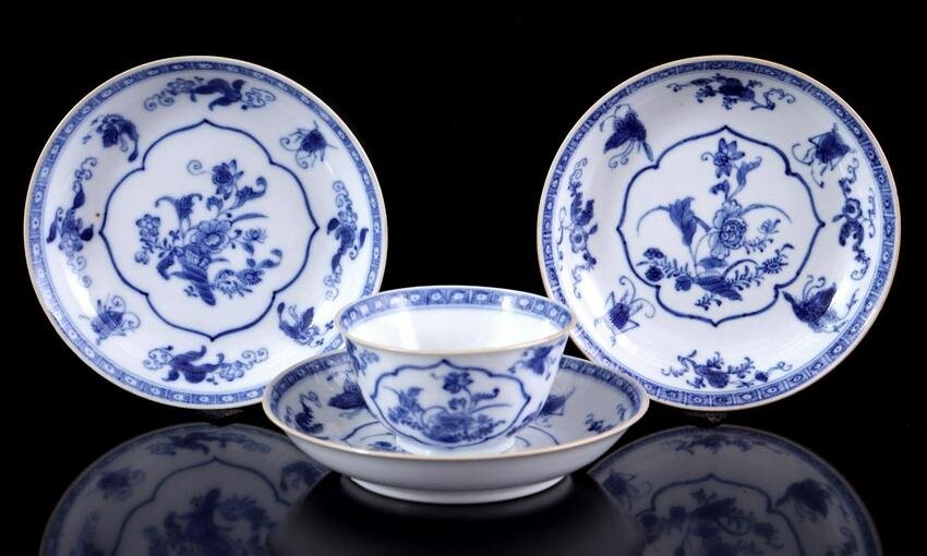 3 porcelain saucers and 1 cup with blue and white decor