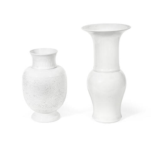 A white-glazed carved lantern vase