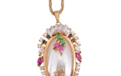 A synthetic gemstone and mabé pearl pendant