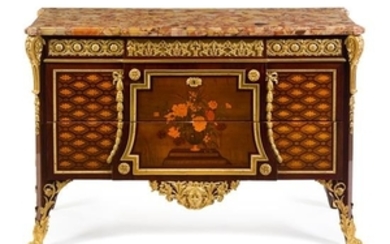 A Louis XVI Style Gilt Bronze Mounted Marquetry Commode