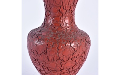 A 19TH CENTURY CHINESE CARVED CINNABAR LACQUER VASE Qing. 16...