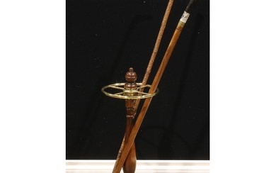 A 19th century design walnut and brass-mounted walking stick...