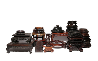 A COLLECTION OF CHINESE WOOD STANDS AND A COVER