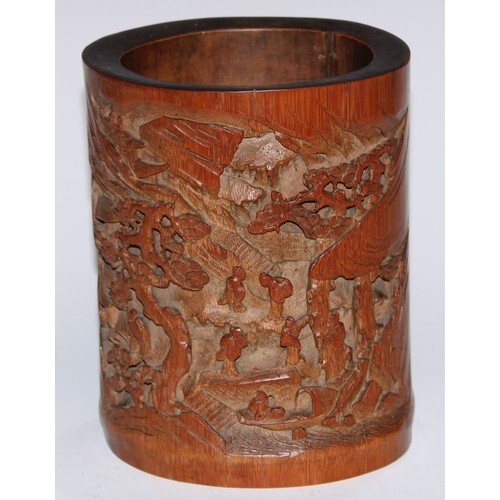 A Chinese bamboo bitong brush pot, well-carved in relief wit...