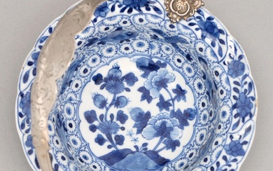 A Chinese blue and white dish, 18th c, painted to the well w...