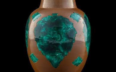 A Chinese brown-ground jar with 'dragons' in leaf vignettes, 18th century