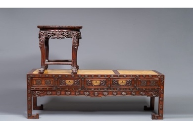 A Chinese carved wooden stand and a low table with marble to...