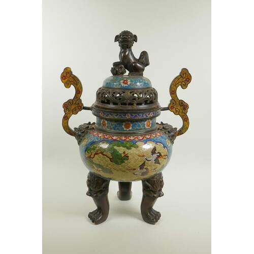 A Chinese cloisonne two handled censer and cover on tripod s...