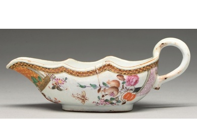 A Chinese famille rose sauce boat, c1760, decorated with flo...