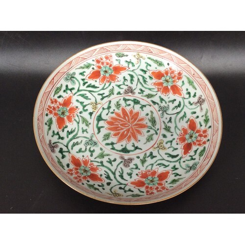 A Chinese ‘famille vert’ porcelain dish decorated with green...