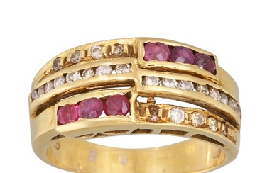 A DIAMOND AND RUBY DRESS RING, channel set, mounted in 18ct ...