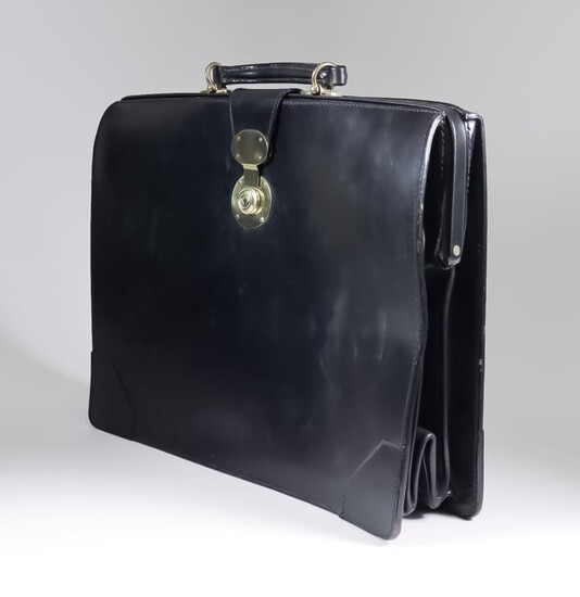 A Document Case by Simpson of London, in black...