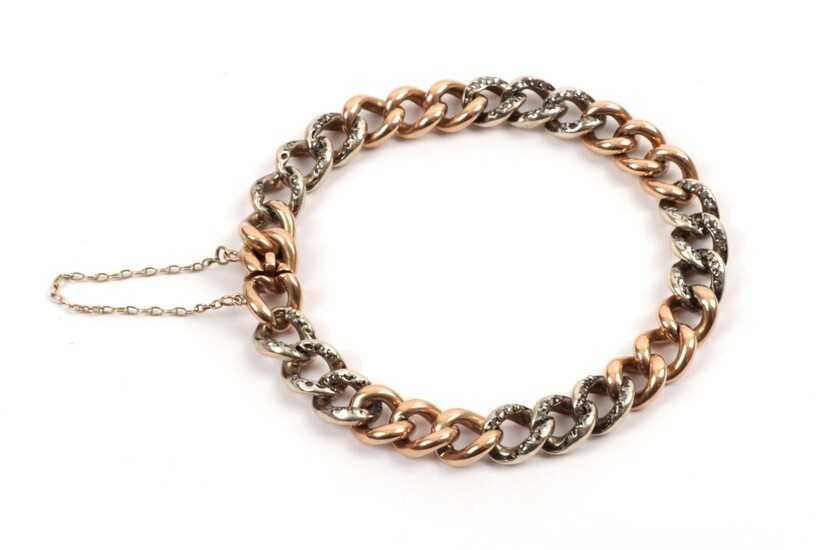 A French Diamond Set Bracelet, the curb links in series of three, alternating plain yellow and...