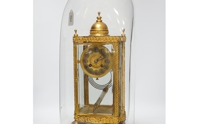A French four glass mantel clock striking on a coiled gong w...