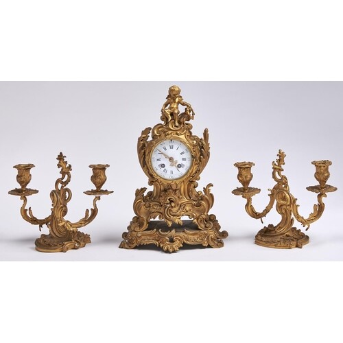 A French ormolu mantle clock, c1870, in Louis XV style, sur...