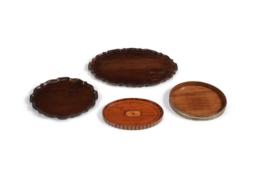 A George III mahogany 'pie crust' oval tray