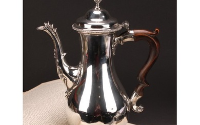 A George III silver baluster coffee pot, quite plain, hinged...