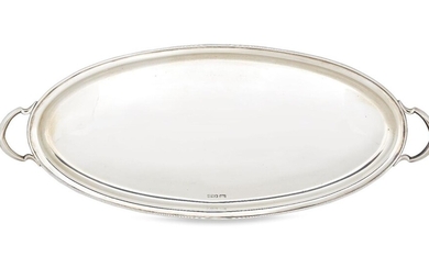 A George V twin-handled silver tray, Sheffield, c.1918, Atkin Bros., of plain oval form with shaped handles, 20cm wide, 47.5cm long, approx. weight 23.8oz