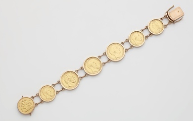 A German 14k rose gold bracelet with seven gold coins.