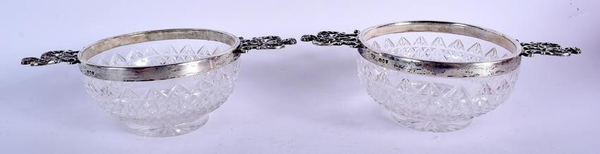 A PAIR OF LATE VICTORIAN SILVER MOUNTED GLASS BOWLS.