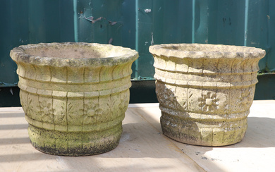 A PAIR OF RECONSTITUTED STONE GARDEN PLANTERS.