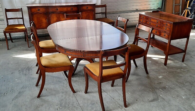 NOT SOLD. A Regency style mahogany dining room suite consisting of a dining table, six...