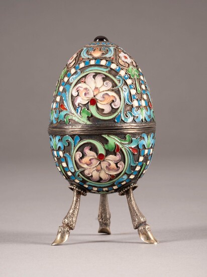 A SILVER AND CLOISONNÉ ENAMEL EGG-SHAPED BOX ON STAND