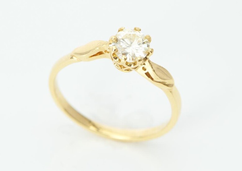 A SOLITAIRE DIAMOND RING Featuring a round brilliant cut diamond weighing an estimated 0.53cts, in 18ct gold, ring size O, 2.4GMS