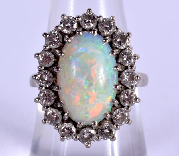 A VINTAGE 18CT WHITE GOLD OPAL AND DIAMOND RING. 8.2