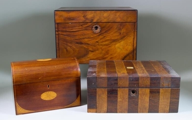 A Victorian Figured Walnut Workbox, the lid lifting to...