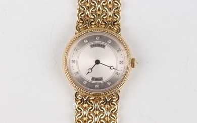 A Waltham 18ct gold circular cased gentleman's bracelet wristwatch with signed and jewelled gil