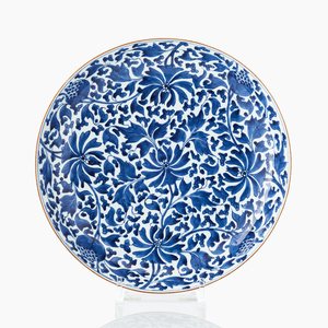A blue and white saucer dish