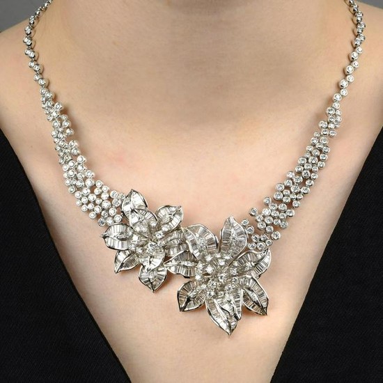 A brilliant and baguette-cut diamond floral necklace.
