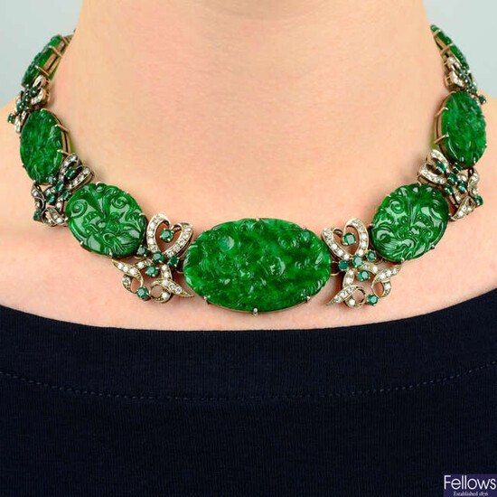 A carved A-type jade, brilliant-cut diamond and emerald necklace.