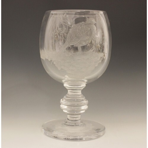 A clear glass chalice engraved with game birds in flight, 20...