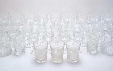 A collection of Thomas Webb cut crystal drinking glasses, 20th century, comprising: nine red wine glasses, 15cm high, seven white wine glasses, 13cm high, twelve sherry glasses, 11cm high, together with three other wine glasses and eight tumblers...