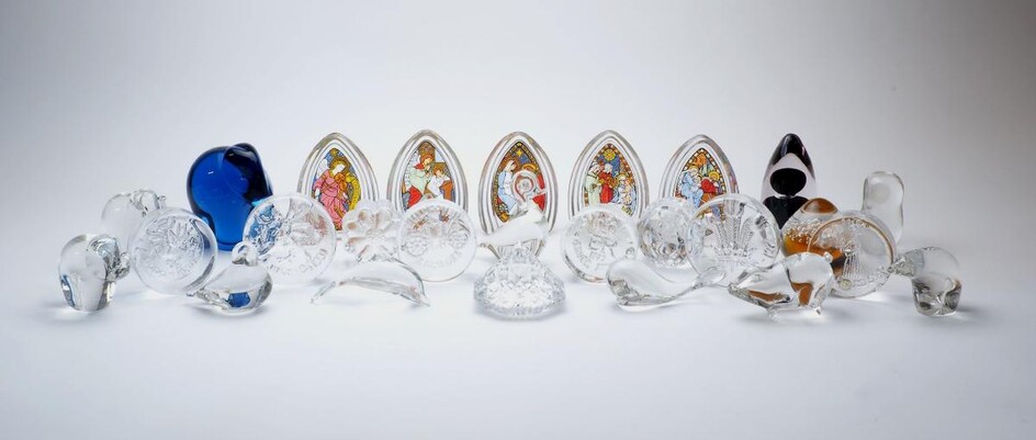 A collection of twenty six glass paperweights, various makers, comprising: Dartington: commemorative examples for 2nd June 1953, Coronation of Queen Elizabeth II; 2nd June 1977 Silver Jubilee of Queen Elizabeth II, 29 July 1981, the Wedding of...