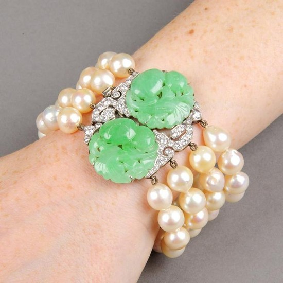 A cultured pearl four-strand bracelet, with carved and