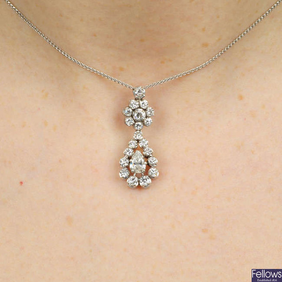 A diamond cluster pendant, with 18ct gold chain.
