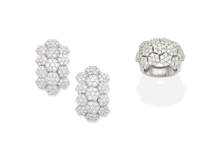 A diamond dress ring and earclip suite